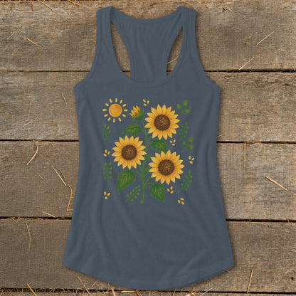 Dark blue racerback tank top with a scattered sunflower and sun graphic print.