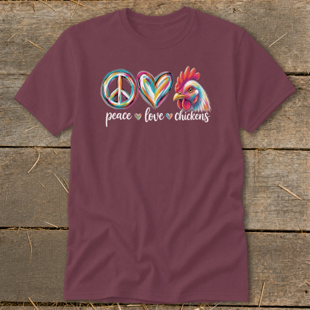 Maroon t-shirt with peace, heart, and chicken graphic and text.