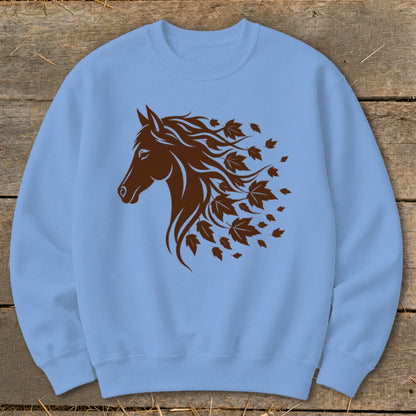 Light blue sweatshirt with a brown horse head and flowing mane made of leaves.