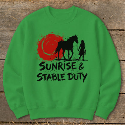 Green sweatshirt with black silhouette of a horse, person, and red sunrise, text "SUNRISE & STABLE DUTY".