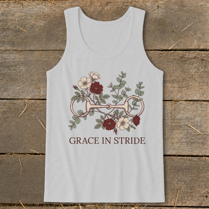 Light gray tank top with a horse bit and flowers graphic and the text "GRACE IN STRIDE."