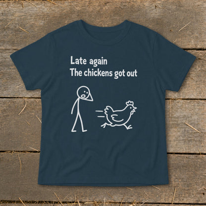 Dark blue t-shirt with white text and stick figure: "Late again The chickens got out"