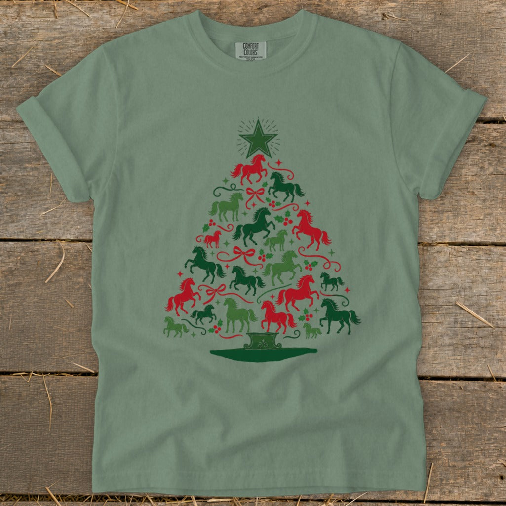 Green t-shirt with a Christmas tree pattern made of red and green horses.