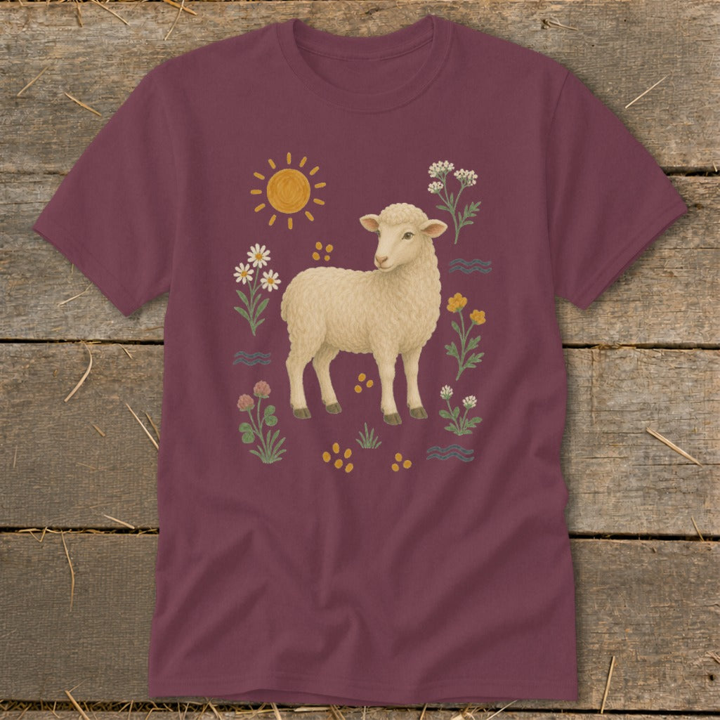 Maroon t-shirt with a fluffy sheep surrounded by sun, flowers, and wavy lines.