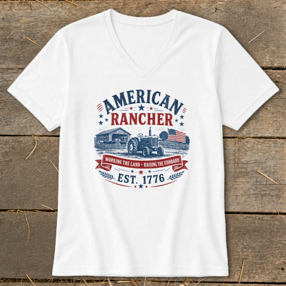 White t-shirt with "American Rancher" graphic, tractor, barn, and flag.