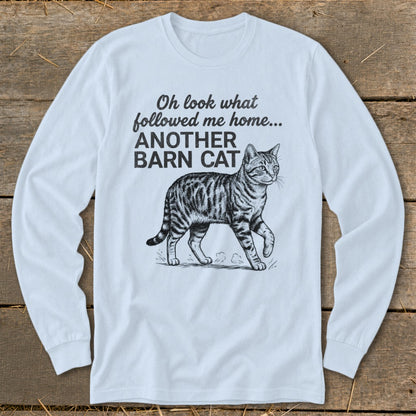 Long sleeve shirt with text "Oh look what followed me home... ANOTHER BARN CAT" and a cat illustration.