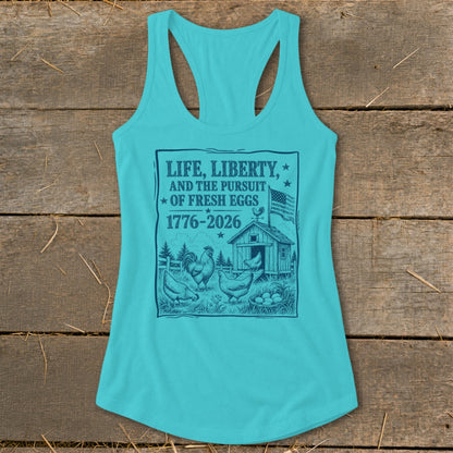 Turquoise tank top with "Life, Liberty, and the Pursuit of Fresh Eggs" text and farm scene.