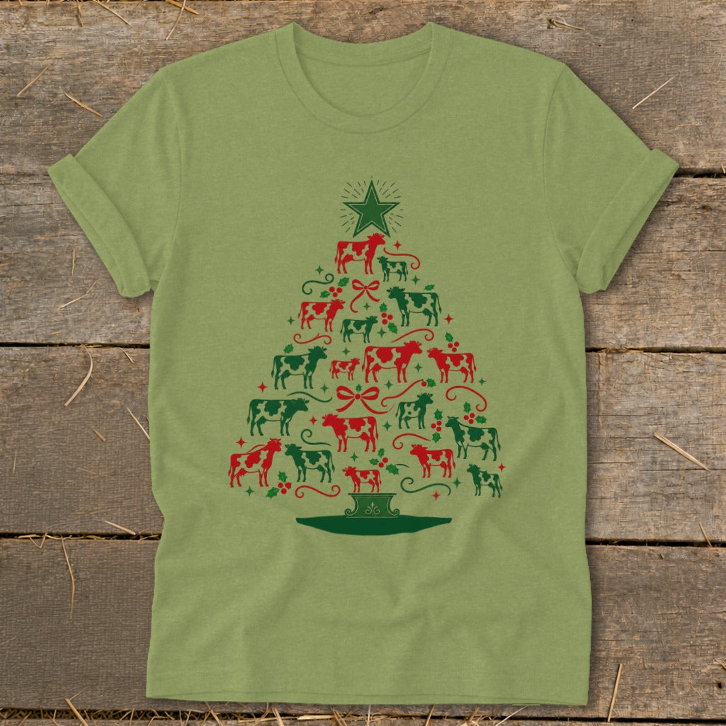 Green t-shirt with a Christmas tree made of red and green cows.