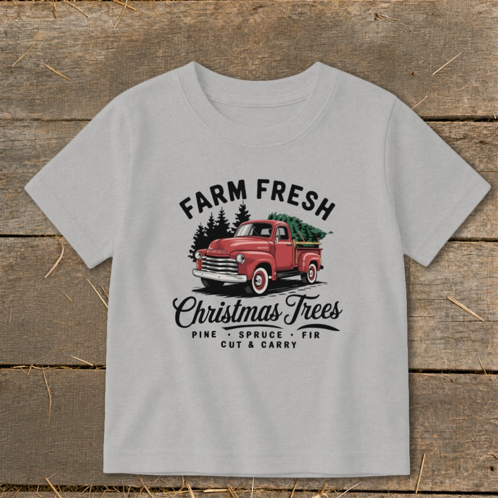 Farm Fresh Christmas Trees graphic with red pickup truck, pine trees, and text.