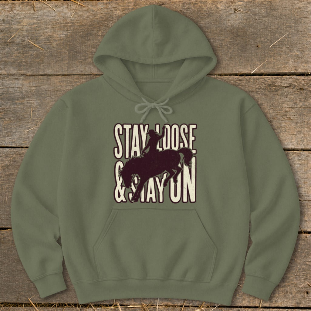 Olive hoodie with "Stay Loose & Stay On" text and bucking bronco silhouette.