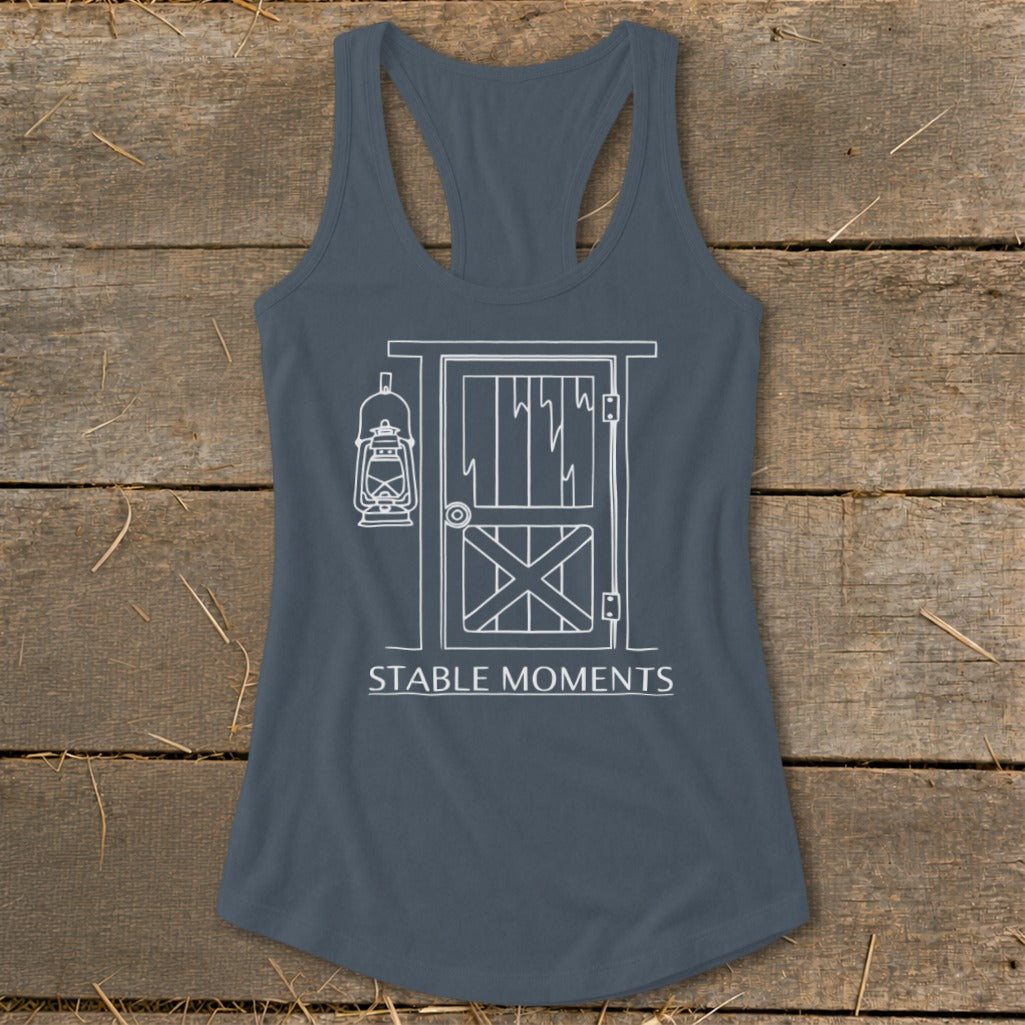 Gray tank top with white line drawing of a barn door and lantern, reads "STABLE MOMENTS".