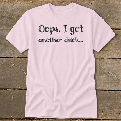 Pink t-shirt with black text that reads "Oops, I got another duck..."