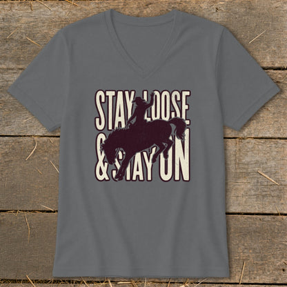 Grey t-shirt with "Stay Loose & Stay On" text and rodeo rider silhouette.
