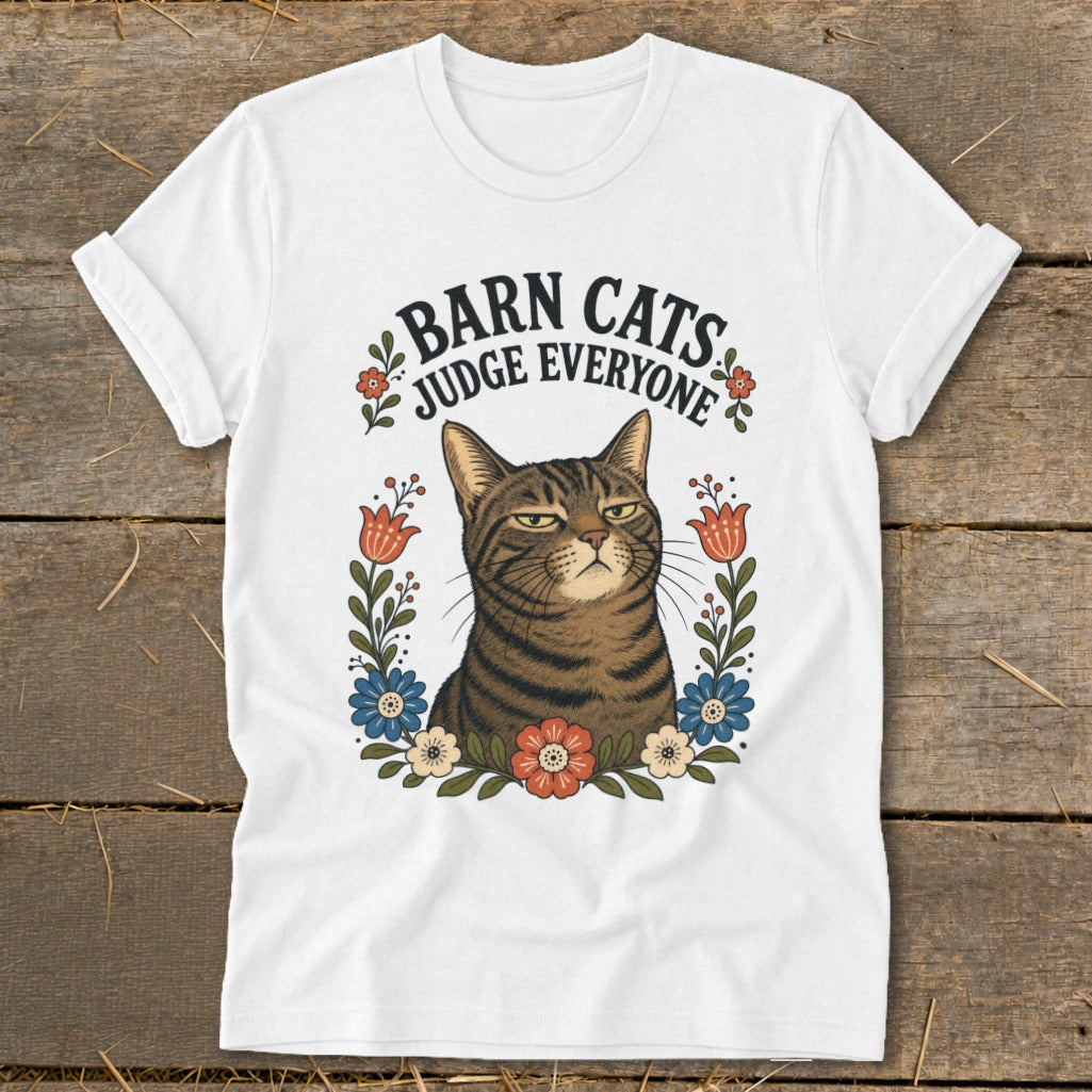White t-shirt with a tabby cat and "Barn Cats Judge Everyone" text.