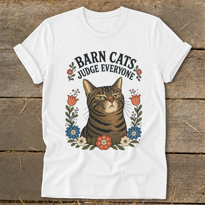 White t-shirt with a tabby cat and "Barn Cats Judge Everyone" text.