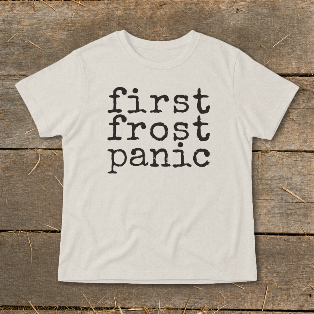 Cream t-shirt with black text reading "first frost panic" in stacked lines.