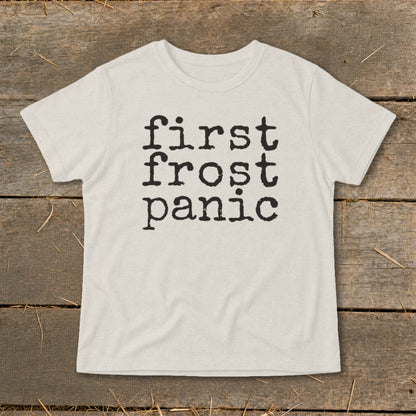 Cream t-shirt with black text reading "first frost panic" in stacked lines.
