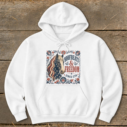 White hoodie with a horse graphic and text "HOOFBEATS & FREEDOM SINCE 1776".