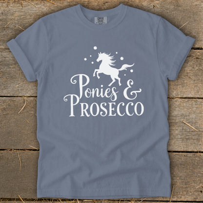 Grey t-shirt with white graphic of a prancing horse and "Ponies & Prosecco" text.
