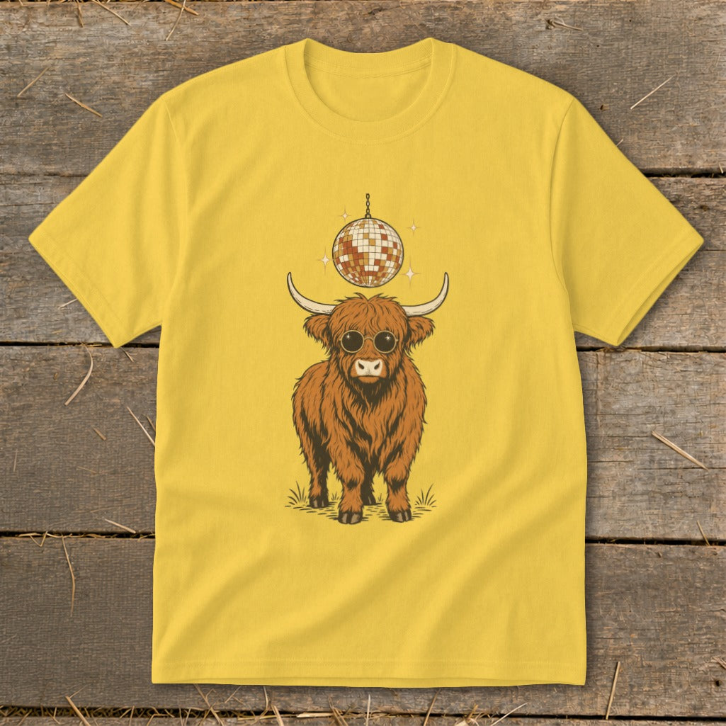 Yellow t-shirt with a Highland cow wearing sunglasses and a disco ball.