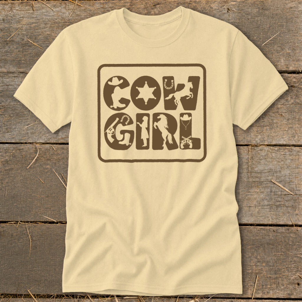 Tan t-shirt with brown "Cowgirl" text and Western graphics within a rounded rectangle.