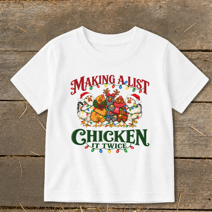 White t-shirt with chickens wearing Santa hats, decorated with Christmas lights and text.