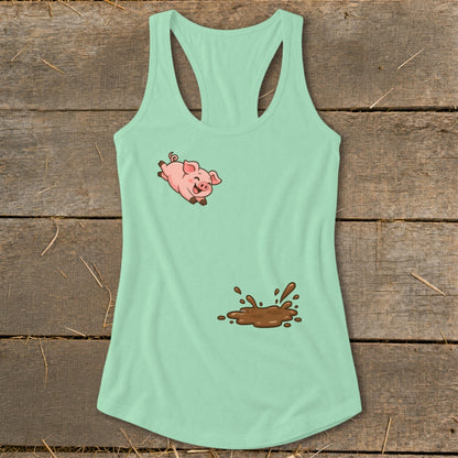Mint green tank top with a cartoon pig jumping into a mud puddle graphic.