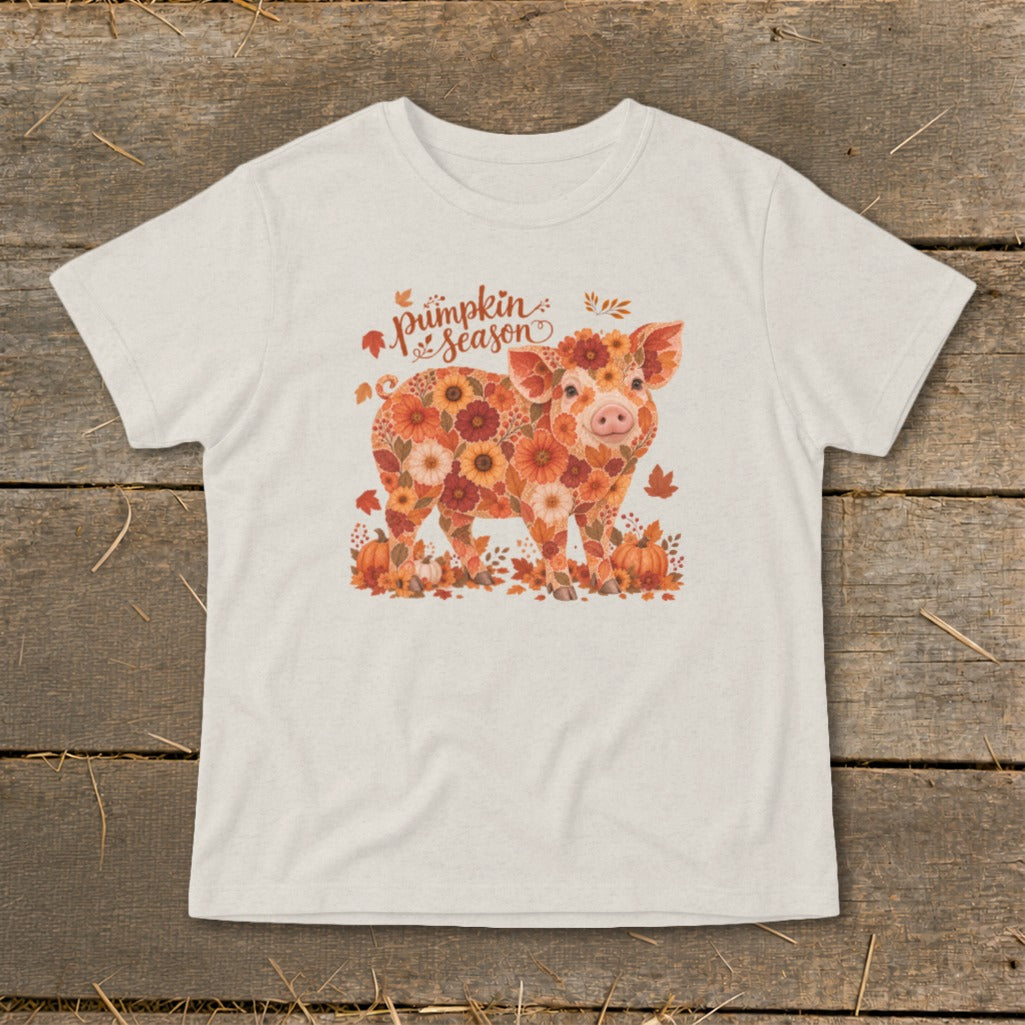 Pig adorned with flowers and leaves, text "pumpkin season" above.