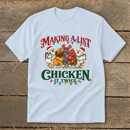Light blue t-shirt with "Making a list, chicken it twice" text and festive chickens.