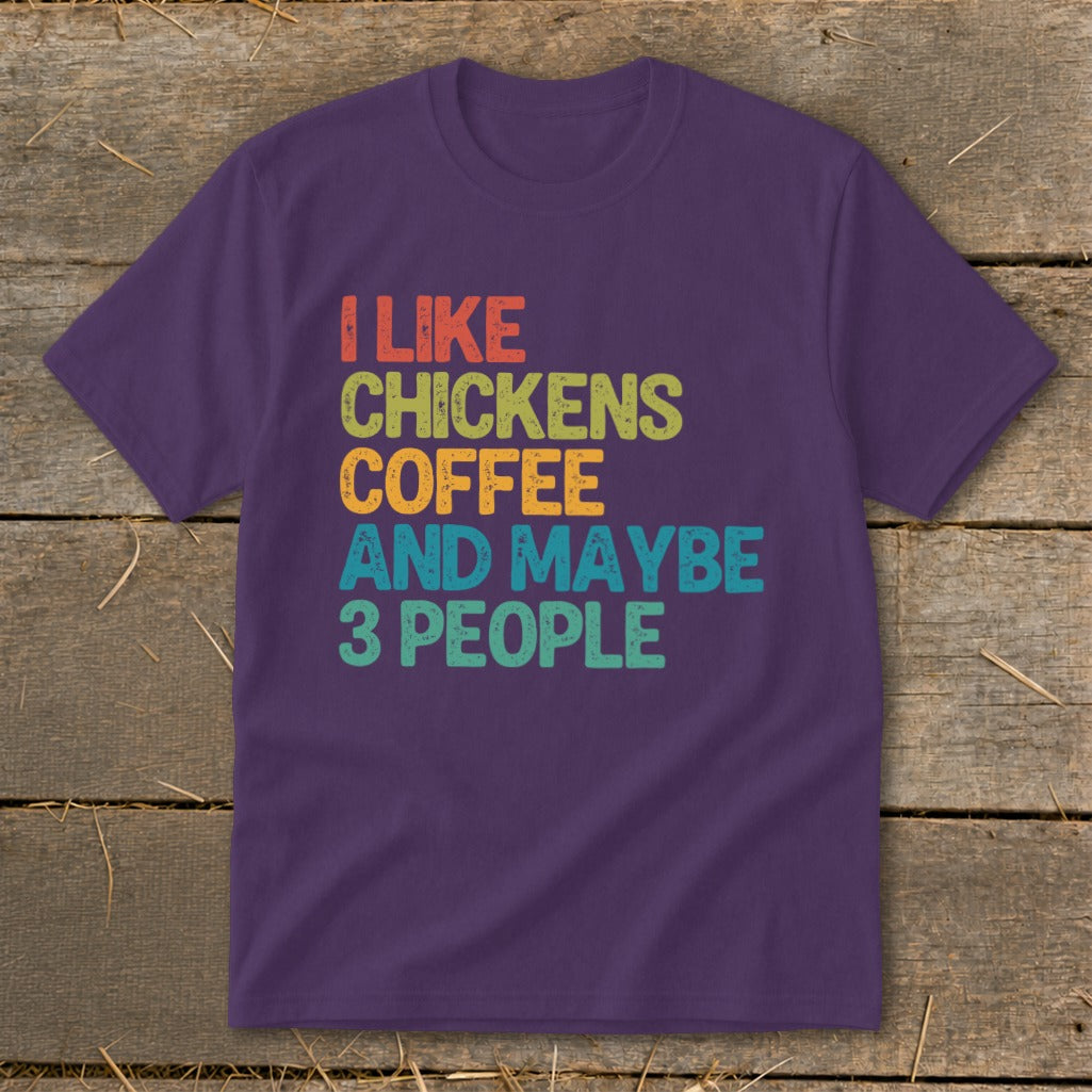 Purple t-shirt with text "I like chickens coffee and maybe 3 people".