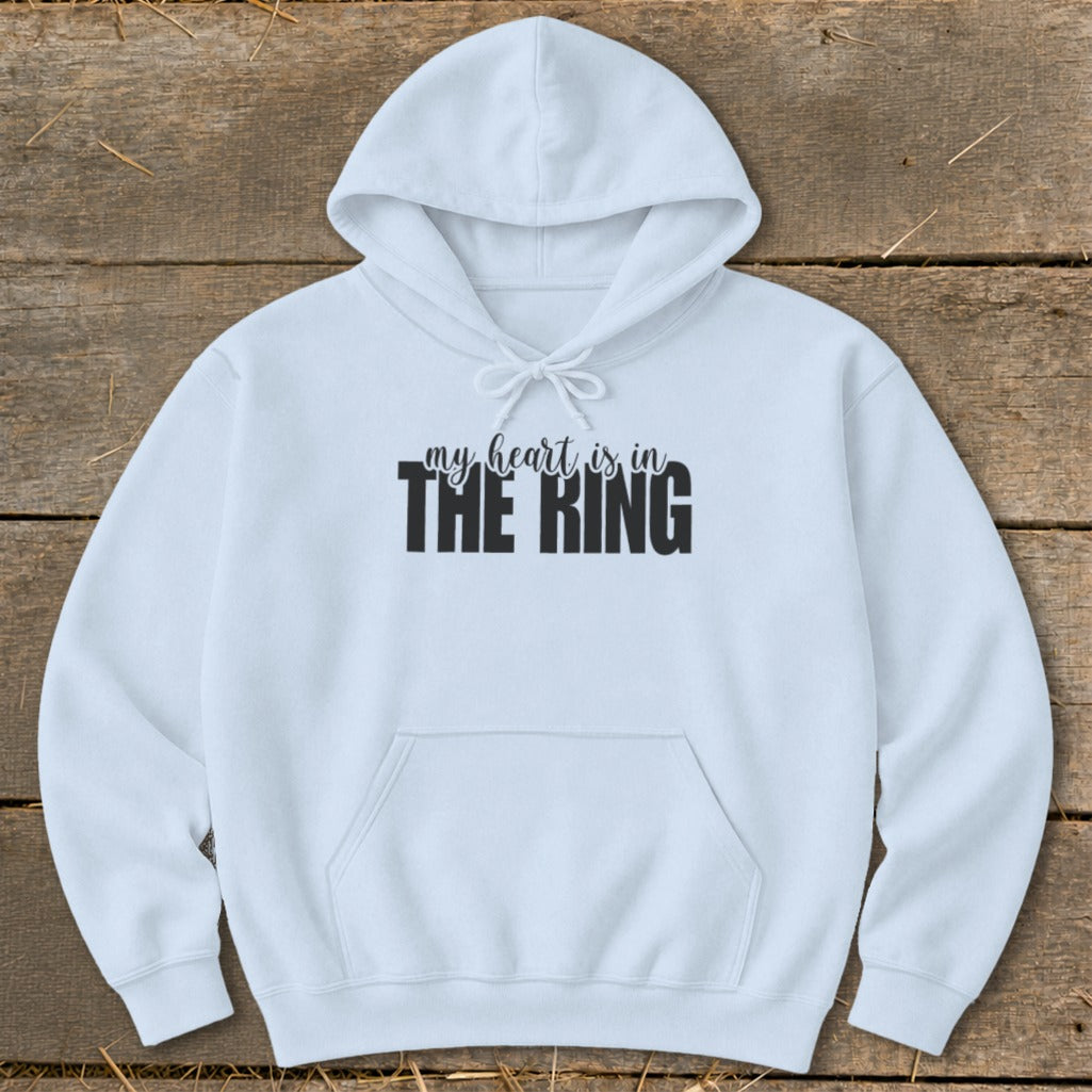 Light blue hooded sweatshirt with "my heart is in THE RING" graphic.