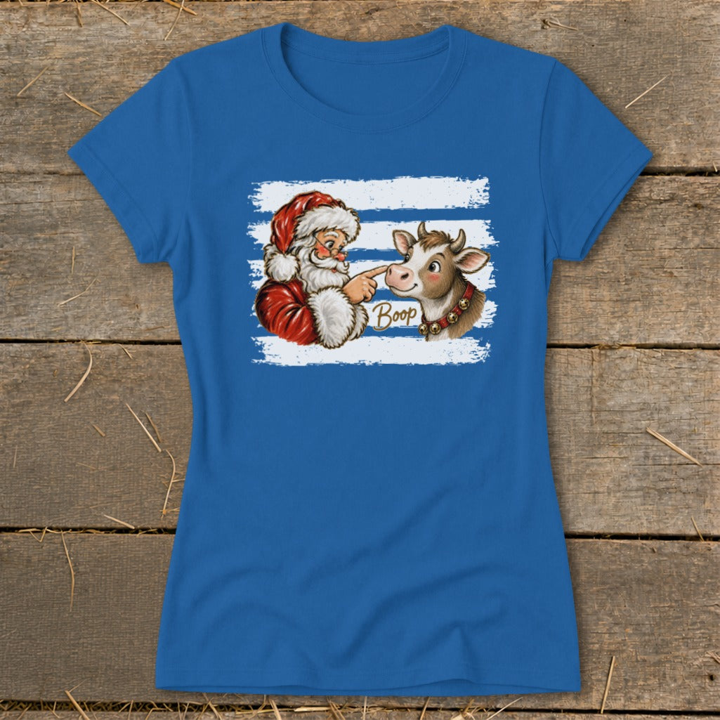 Santa booping a cow's nose with the word "Boop" on a blue t-shirt.
