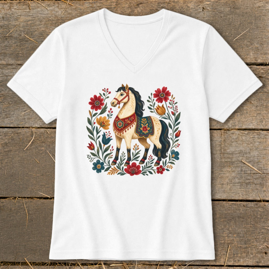 White t-shirt featuring a decorative horse surrounded by floral elements.