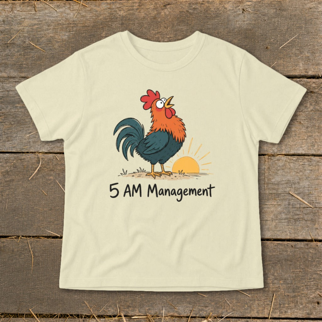 Cream t-shirt with cartoon rooster crowing at sunrise and text "5 AM Management".