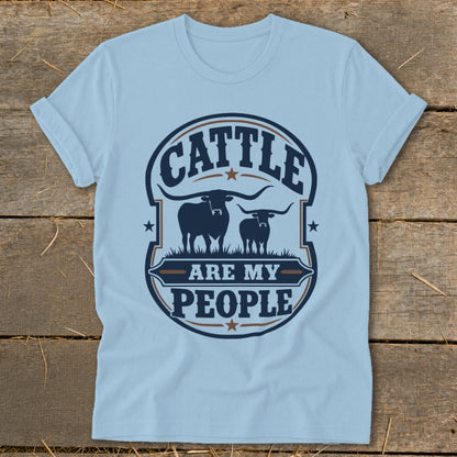 Light blue t-shirt with "Cattle Are My People" text and two longhorn cattle graphics.