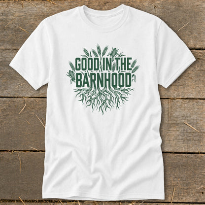 White t-shirt with green text and graphic: "Good in the Barnhood" with roots and wheat.