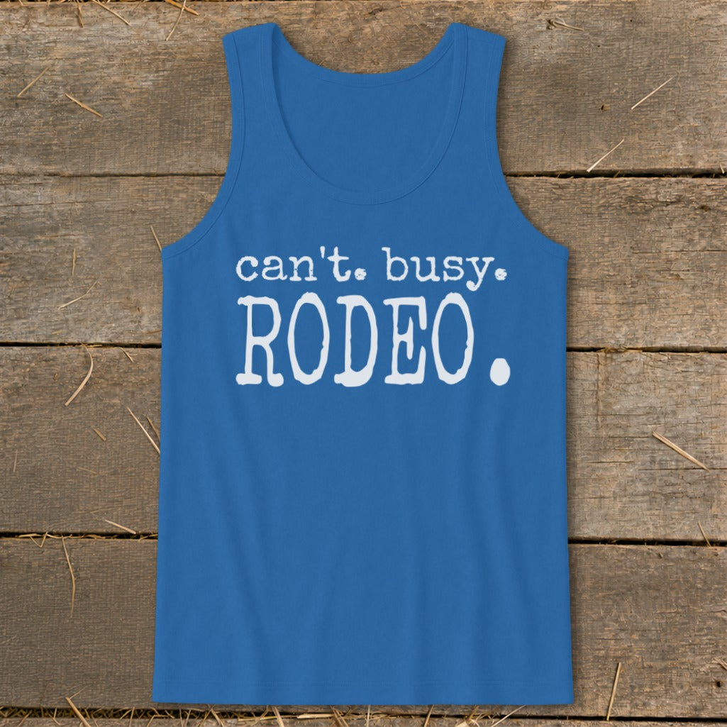 Blue tank top with white text that reads "can't. busy. RODEO."