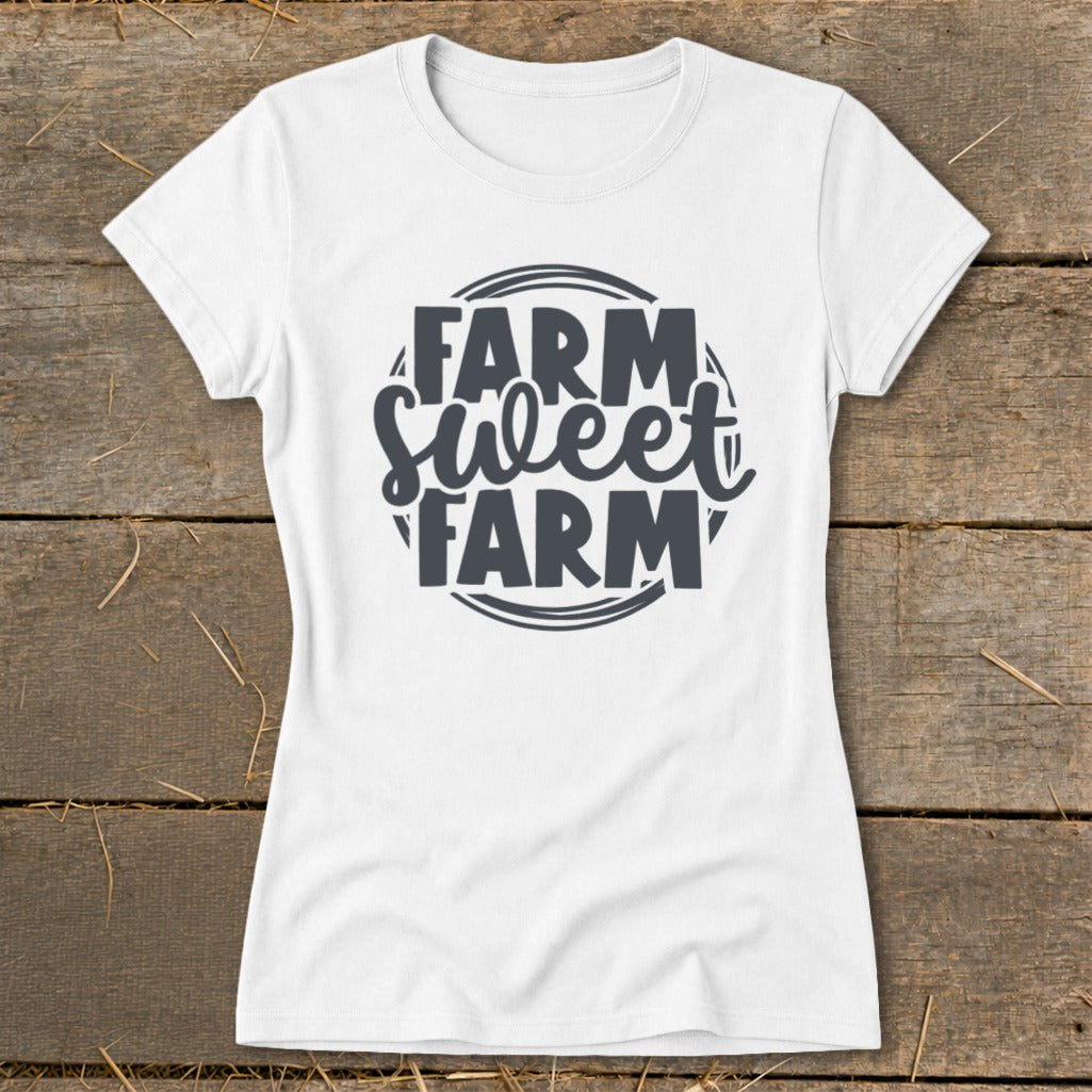 White t-shirt with "Farm Sweet Farm" graphic in dark gray text.