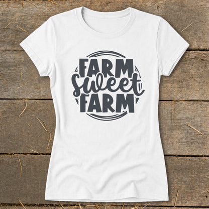 White t-shirt with "Farm Sweet Farm" graphic in dark gray text.
