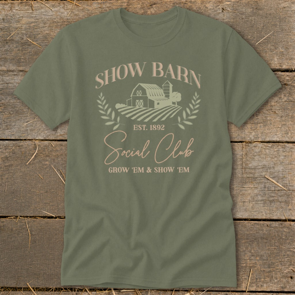 Olive green t-shirt with "Show Barn Social Club" text and barn graphic.