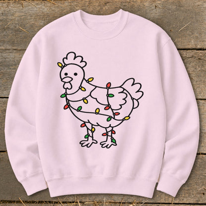 Light pink sweatshirt with a black outline drawing of a chicken wrapped in colorful Christmas lights.