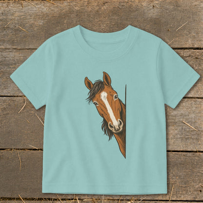 Light blue t-shirt with a graphic of a brown horse peeking from the side.