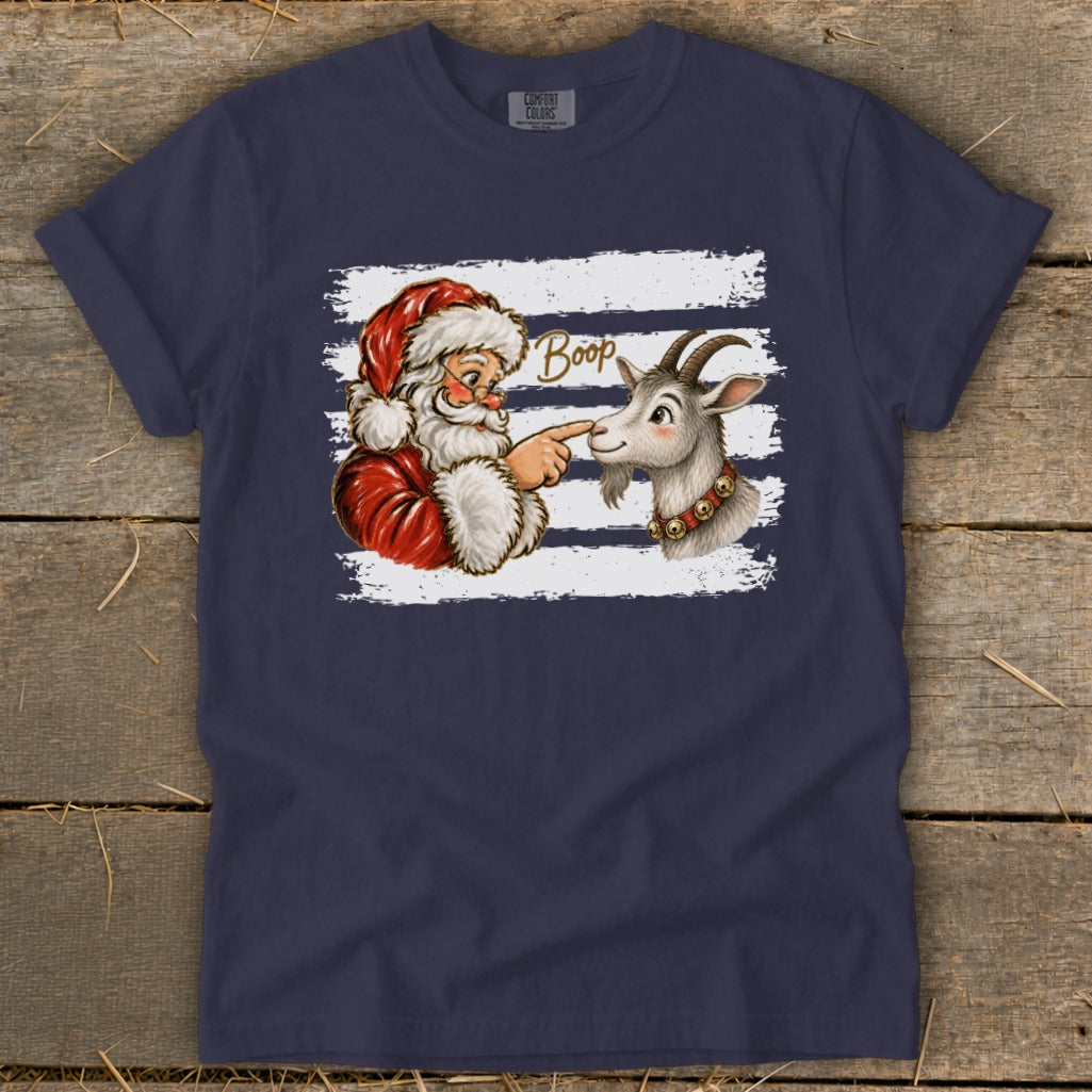 Santa booping a goat on the nose with the word "Boop".