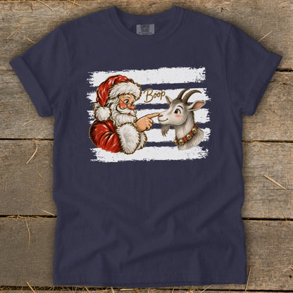 Santa booping a goat on the nose with the word "Boop".