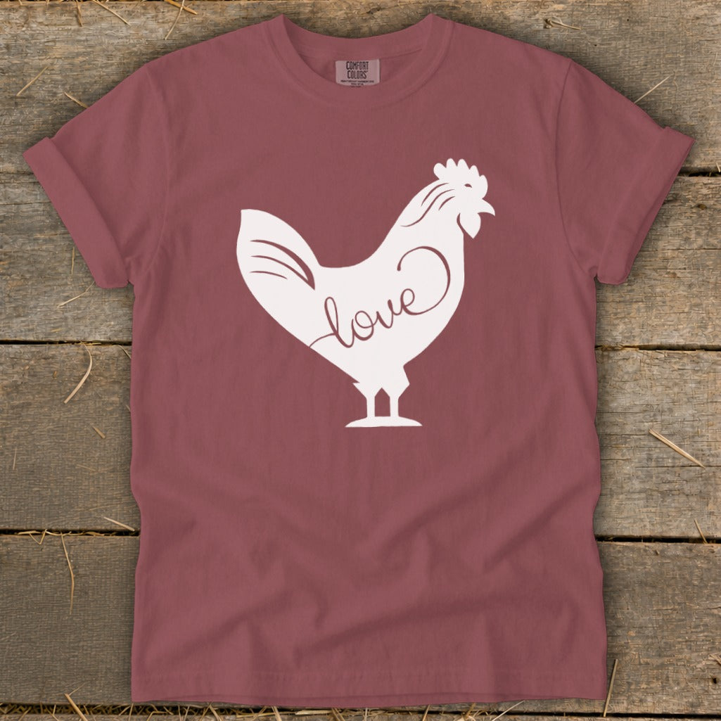 Maroon t-shirt with white chicken silhouette and the word "love".