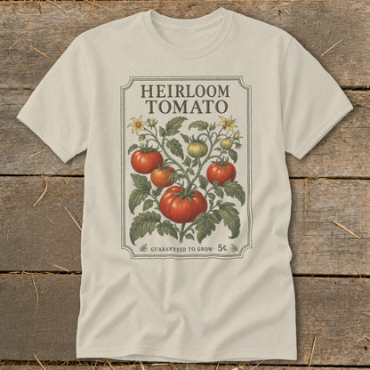 Cream t-shirt with heirloom tomato plant illustration and "Guaranteed to Grow 5¢" text.