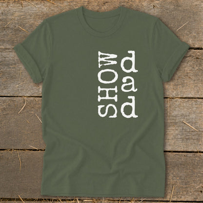 Green t-shirt with white vertical text that reads "Show Dad".