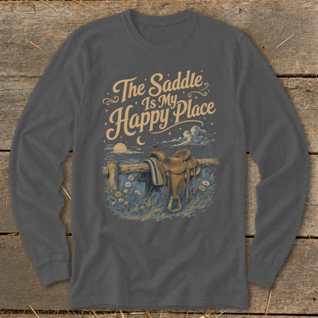 T-shirt graphic with text "The Saddle Is My Happy Place" and a saddle on a fence.