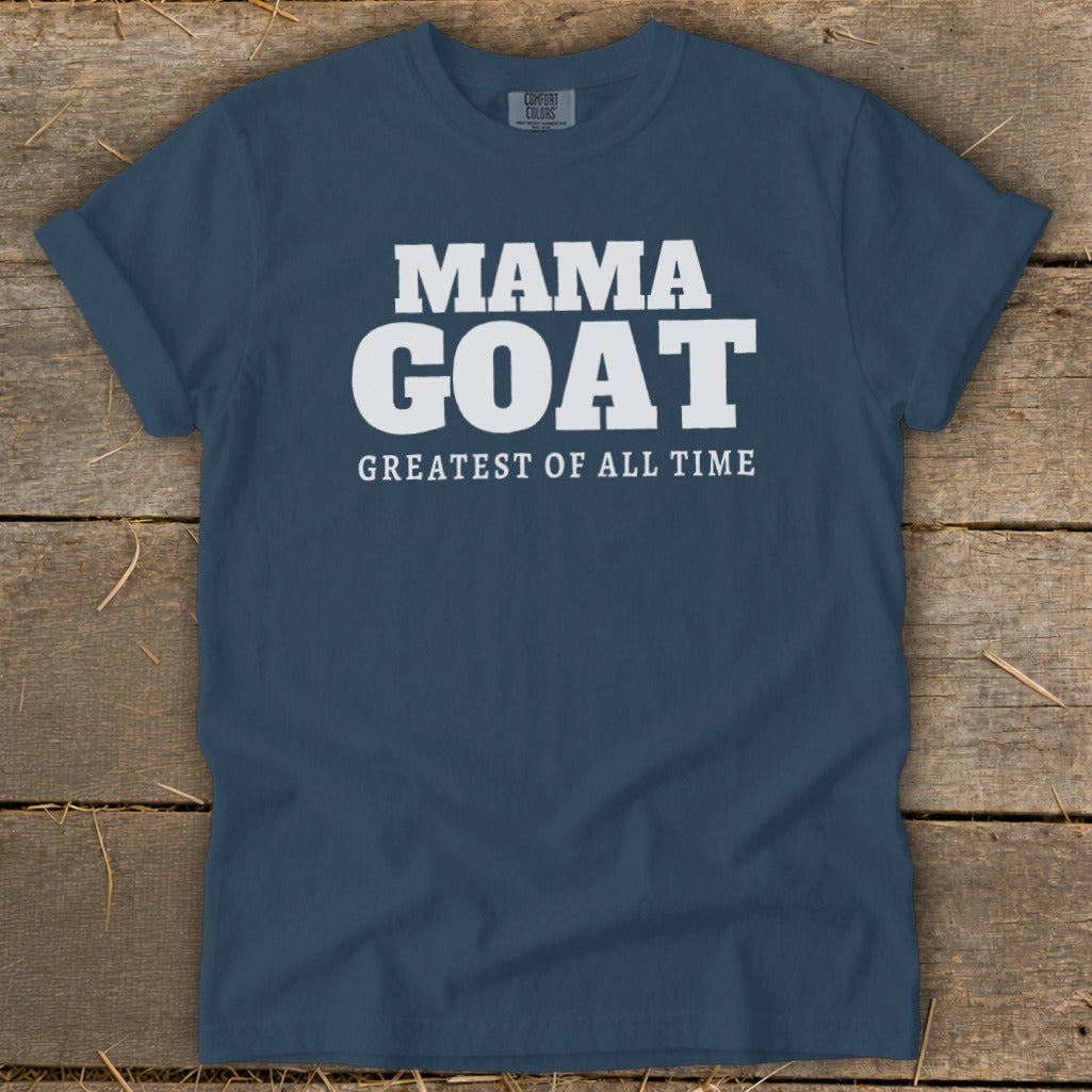 Navy t-shirt with white text reading "MAMA GOAT GREATEST OF ALL TIME".