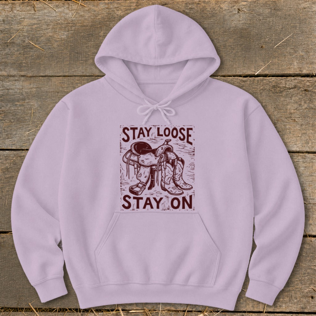Light purple hoodie with maroon graphic of saddle and boots, "STAY LOOSE STAY ON".